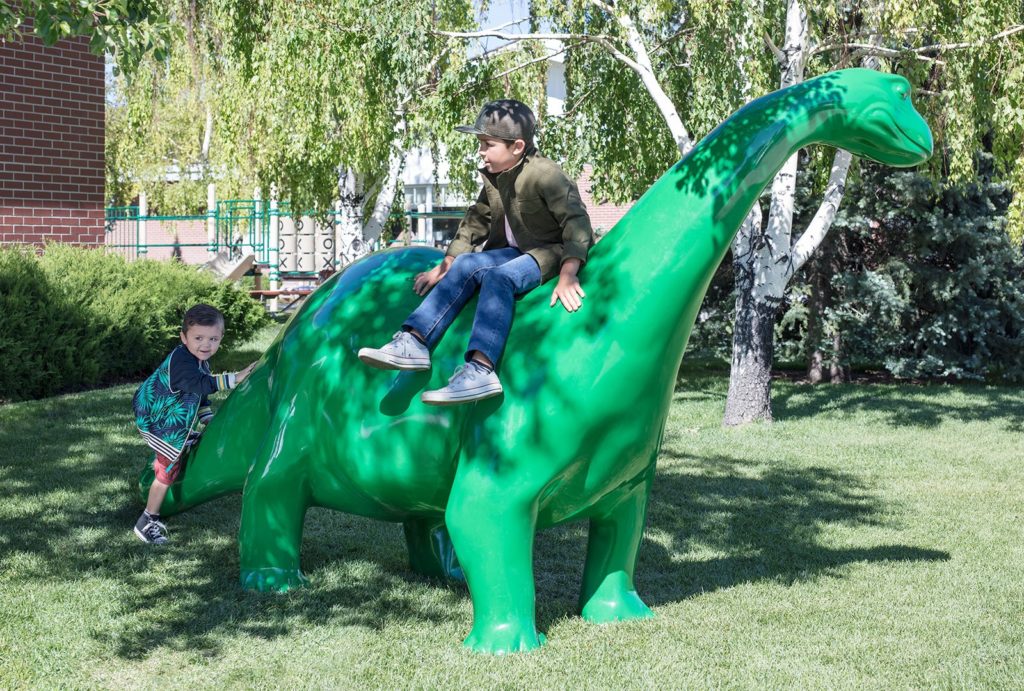 A sinclair dinosaur outside the Little America Travel Center.